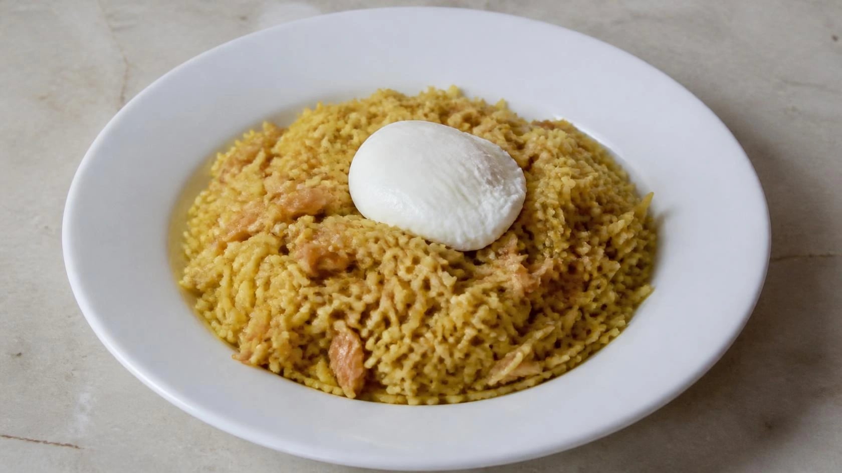 AI-made picture of Kedgeree, poached egg