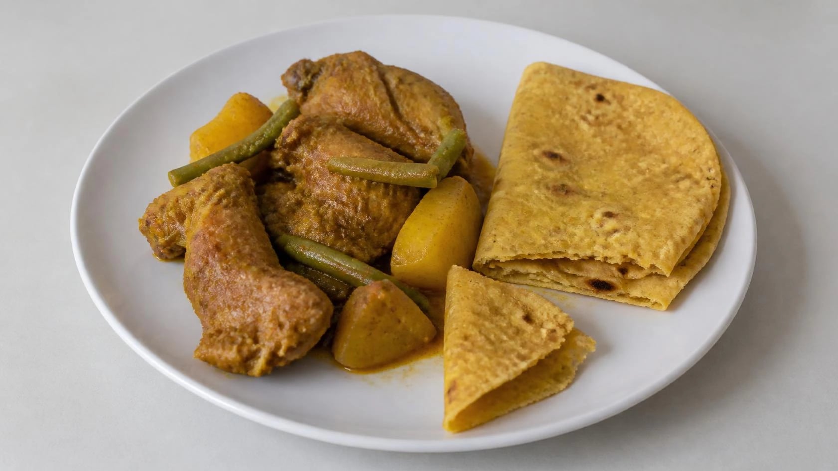 AI-made picture of Kipfilet kerrie (roti)