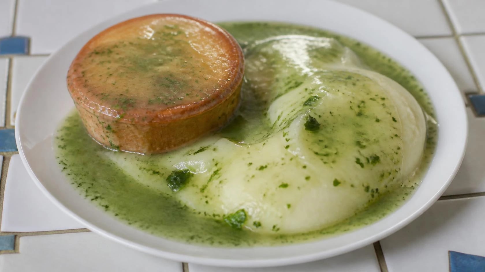 AI-made picture of Pie mash and liquor