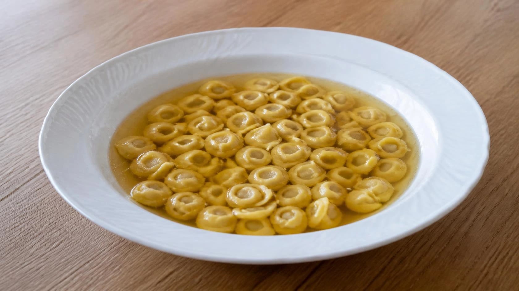 AI-made picture of Tortellini in brodo di cappone